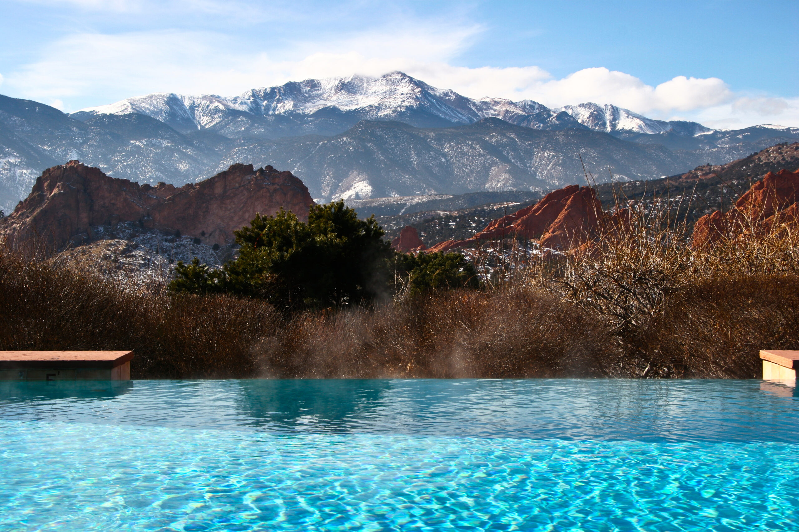 swimming pool with mountain view